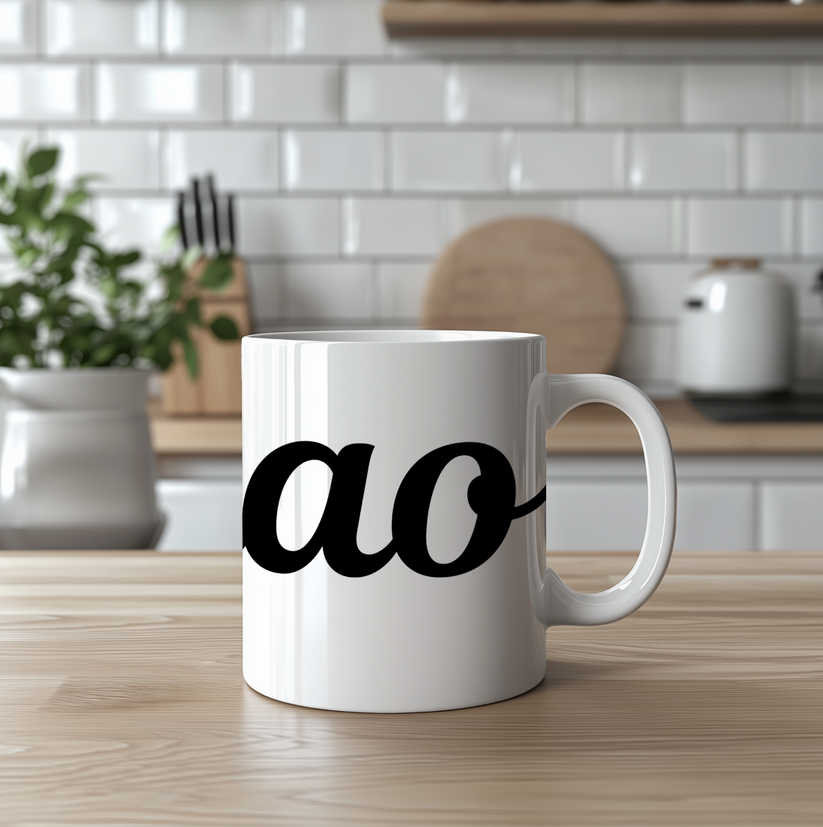 White mug with 'ciao' printed on it in a kitchen setting